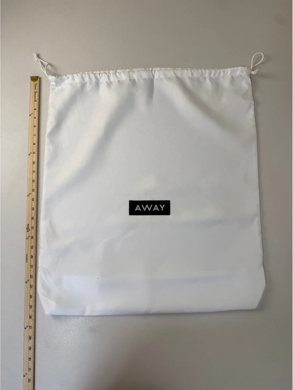 Away White Drawstring Dust Bag for Luggage
